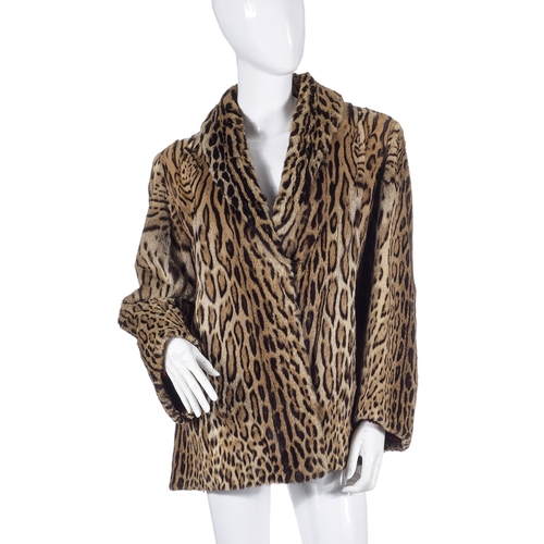 519 - Schwartz, a 1940s ocelot fur jacket, featuring a lapel collar, two hook and eye front fastenings, tw... 