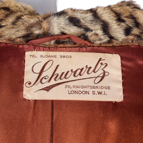 519 - Schwartz, a 1940s ocelot fur jacket, featuring a lapel collar, two hook and eye front fastenings, tw... 