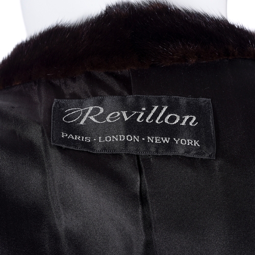 521 - Revillon, a full-length dark ranch mink coat, fully stranded, featuring a notched lapel collar, hook... 