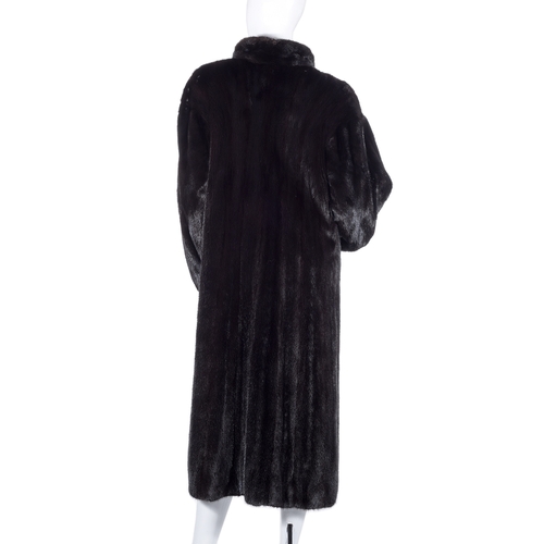 525 - London Label, a full-length dark ranch mink coat, fully stranded, featuring a lapel collar, hook and... 