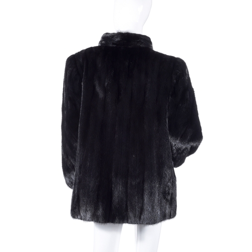 528 - Grosvenor, a three-quarter length black mink jacket, designed with a Mandarin collar, hook and eye c... 