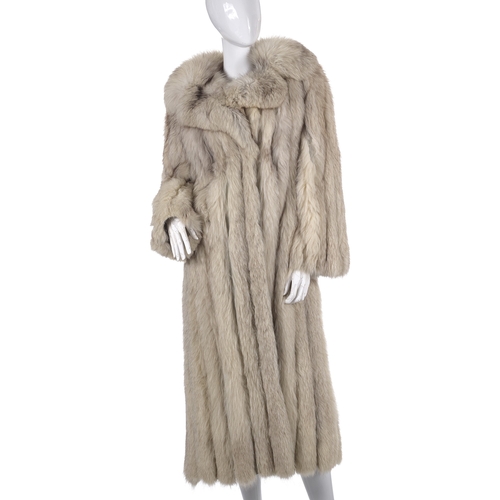 529 - A full-length blue fox fur coat, featuring a notched lapel collar, hook and eye clip fastenings, two... 