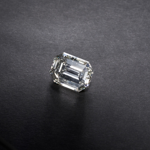 56 - An impressive rectangular-shape diamond, of 9.05ct, estimated L-M colour, VS+ clarity, together with... 