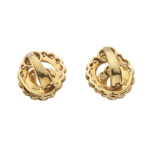 60 - A pair of 18ct gold brilliant-cut diamond swirl clip earrings, estimated total diamond weight 1.10ct... 