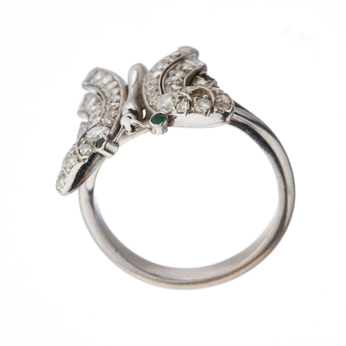 67 - A mid 20th century vari-cut diamond butterfly ring, with green gem eyes, estimated total diamond wei... 