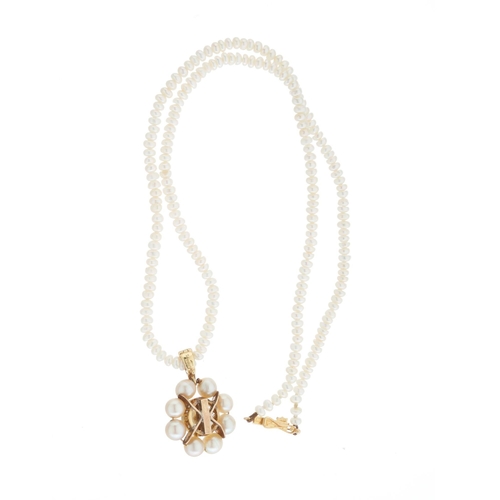 70 - A mid 20th century 9ct gold old-cut diamond and pearl pendant, suspended from a cultured pearl singl... 