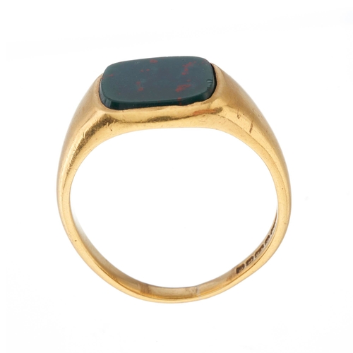 74 - A mid 20th century 18ct gold bloodstone cabochon signet ring, hallmarks for Birmingham 1963, ring si... 