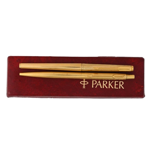 115 - Parker, a 180 fountain pen and a Classic ballpoint pen, each gold plated pin stripe, in a Parker box... 