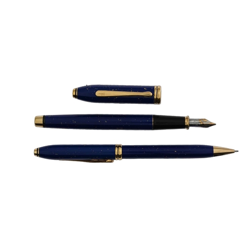 119 - Cross, a Townsend Lapis fountain pen and propelling pencil set, blue lacquer with gold leaf inclusio... 