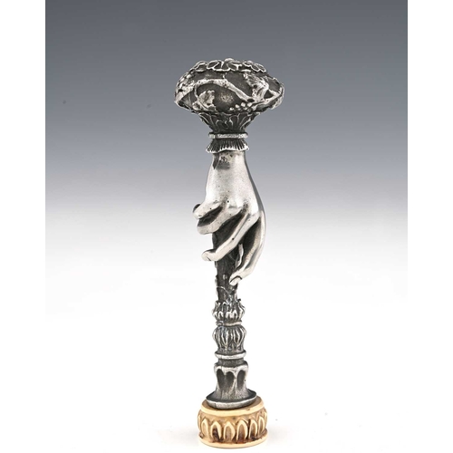 133 - A late 19th Century Continental white metal Art Nouveau hand seal, with ivory intaglio and carved ma... 