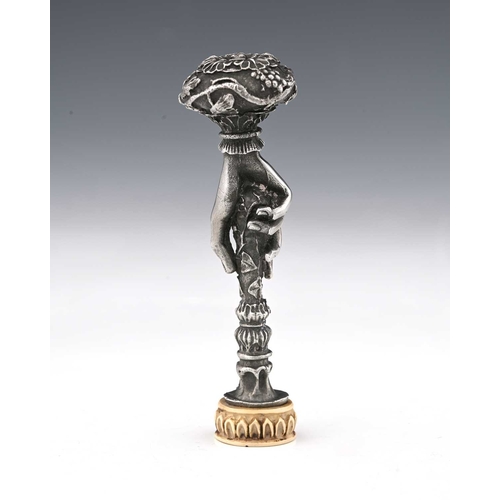 133 - A late 19th Century Continental white metal Art Nouveau hand seal, with ivory intaglio and carved ma... 