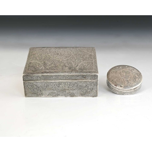 134 - Two Egyptian silver boxes, each decorated with traditional scrollwork, the rectangular cigarette box... 