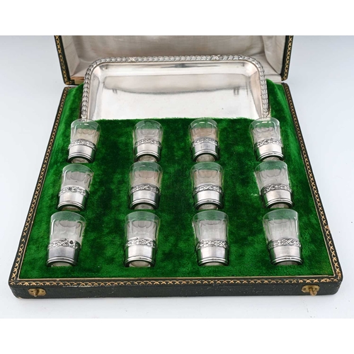 141 - A French cased liqueur set, the interior with first standard (0.950) silver fitments, including a sa... 