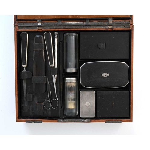 142 - A French silver gentleman's travelling dressing case, the leather case ensuite with first standard s... 