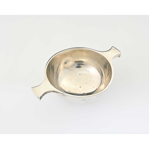 144 - A George V Scottish silver quaich, of conventional form with opposing lug handles, the body inscribe... 