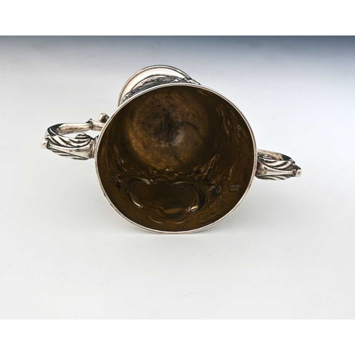 145 - Ireland, an eighteenth-century Irish silver two-handled cup, the body initialled 