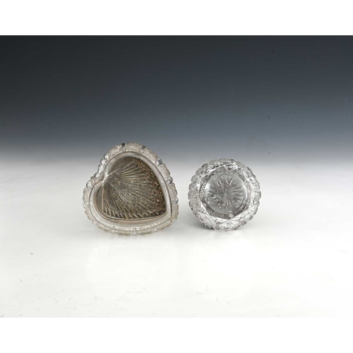 155 - A Victorian silver-mounted cut glass scent bottle, of grenade form, the silver decorated with diaper... 