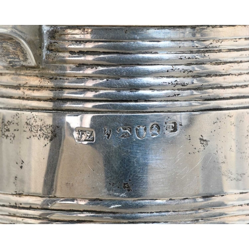 157 - A George III English provincial silver mug, of tapered cylindrical form, decorated with coopered ban... 