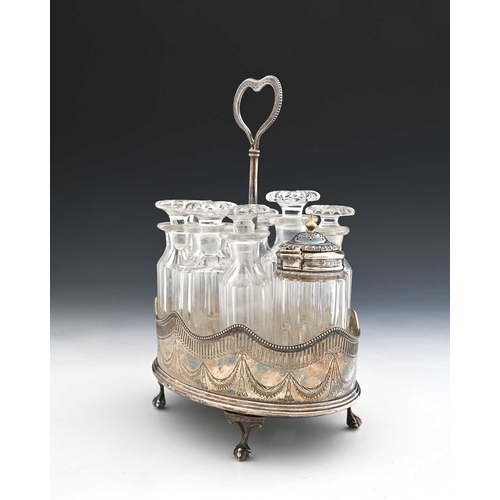 161 - A George III Neoclassical cruet frame, of navette form, with wavy-edge rim, and pierced galleries bo... 