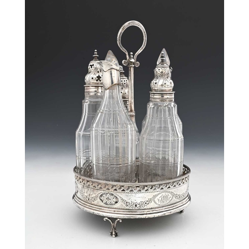 162 - A George III Neoclassical cruet set, five silver-mounted cut glass bottles, the stand with wood base... 