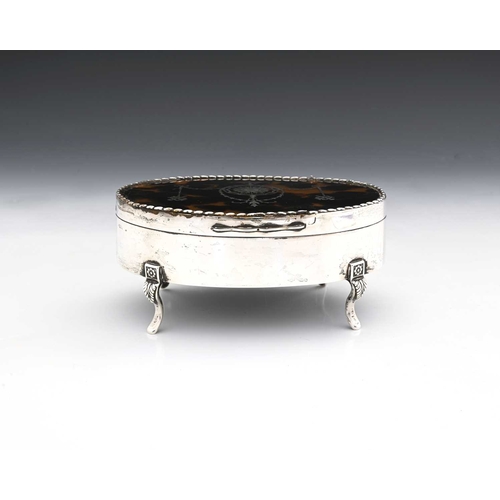 169 - An Edwardian silver and tortoiseshell jewellery box, the hinged cover with pique decoration in the N... 