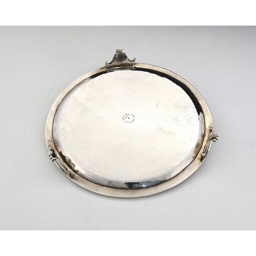 175 - A Victorian silver salver, of round form, with a cast intertwined border, the centre with vacant car... 