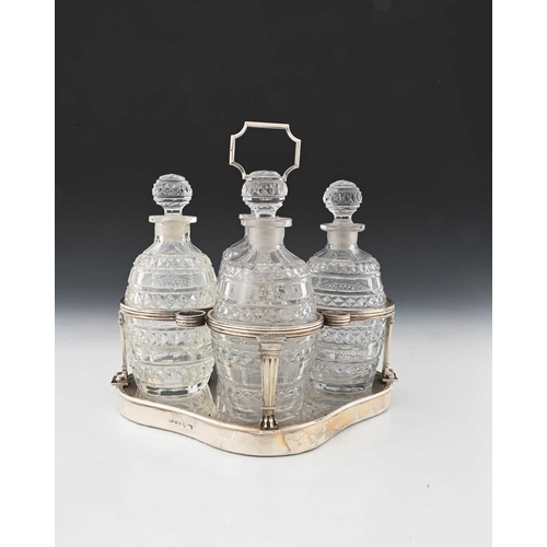 180 - Paul Storr, a George III silver four-bottle decanter set, comprising a silver-mounted stand, the qua... 