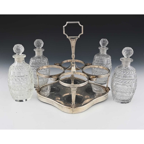 180 - Paul Storr, a George III silver four-bottle decanter set, comprising a silver-mounted stand, the qua... 