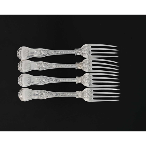 183 - Paul Storr, a set of four George IV cast silver Bacchanalian pattern entree forks, double struck, ea... 