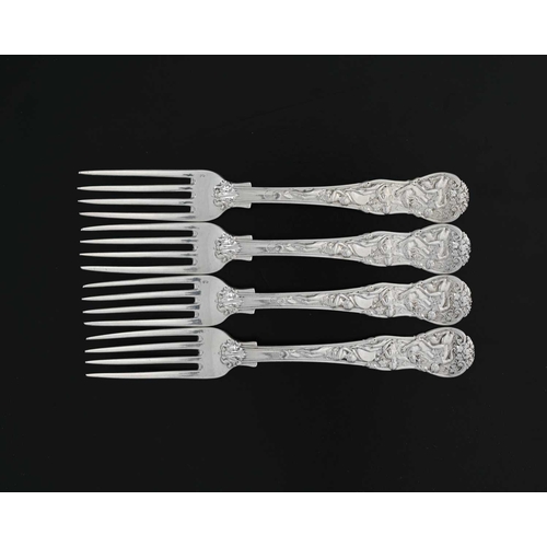 183 - Paul Storr, a set of four George IV cast silver Bacchanalian pattern entree forks, double struck, ea... 