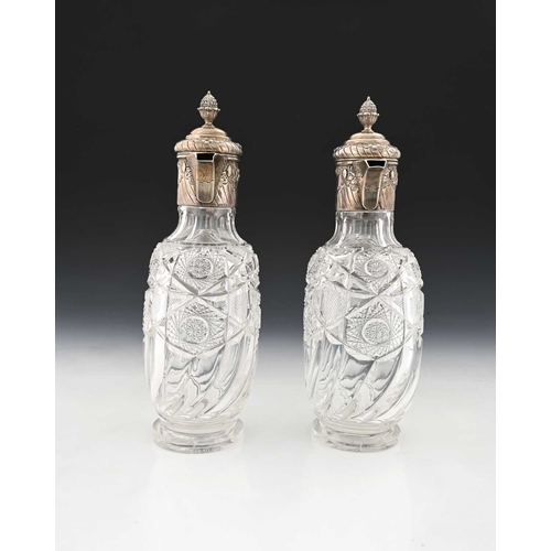 189 - A pair of Victorian silver mounted and cut glass claret jugs, Mappin Brothers, London 1898, the ovoi... 