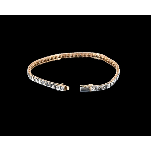 19 - A 9ct gold single-cut diamond line bracelet, total diamond weight 0.25ct, engraved to mount, hallmar... 