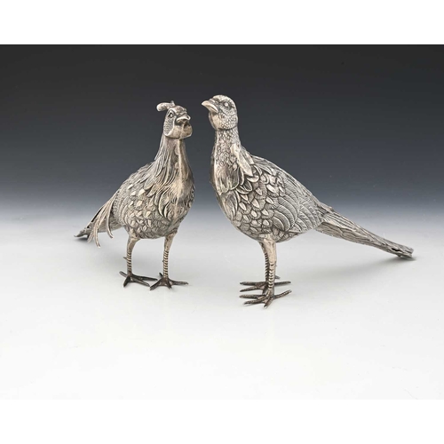 193 - A pair of late nineteenth or early twentieth-century Continental silver-coloured metal pheasant tabl... 