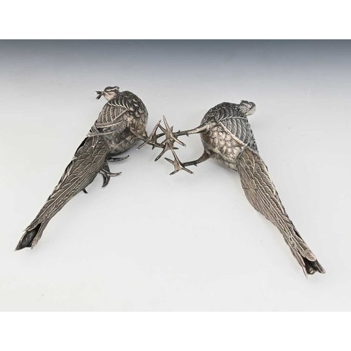 193 - A pair of late nineteenth or early twentieth-century Continental silver-coloured metal pheasant tabl... 