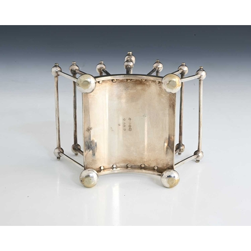 198 - Christopher Dresser for Hukin and Heath, an Aesthetic Movement silver plated six division toast rack... 