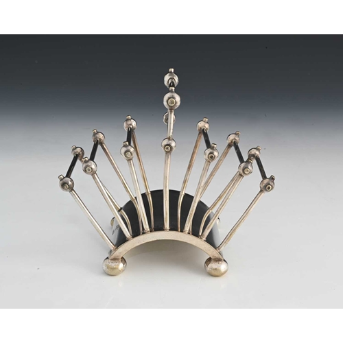 198 - Christopher Dresser for Hukin and Heath, an Aesthetic Movement silver plated six division toast rack... 