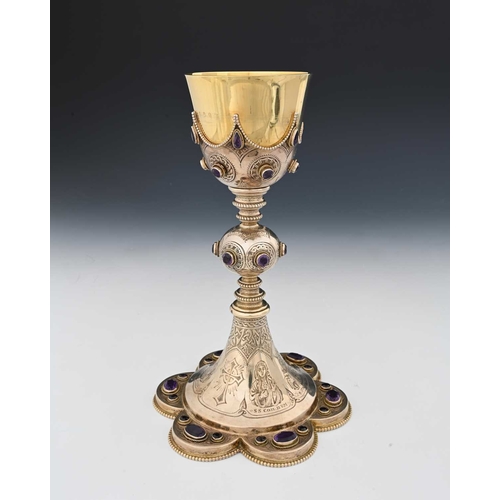 202 - An early twentieth-century Irish eighteen-carat gold and silver chalice, modelled in the Gothic-revi... 