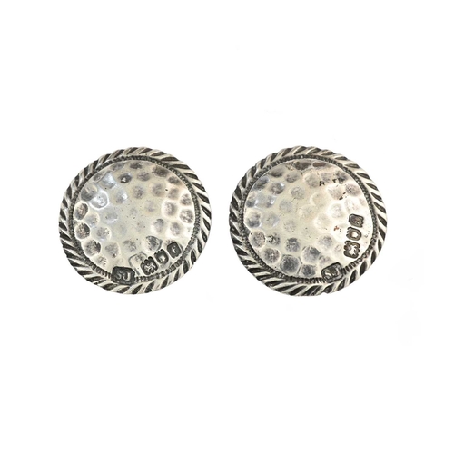 206 - A pair of Arts and Crafts silver buttons, Samuel Jacob, Birmingham 1905, circular planished form wit... 