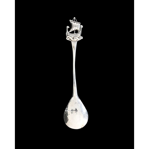 220 - Alexander Ritchie (attributed), an Iona Arts and Crafts silver spoon, cast with a dragon boat in ful... 