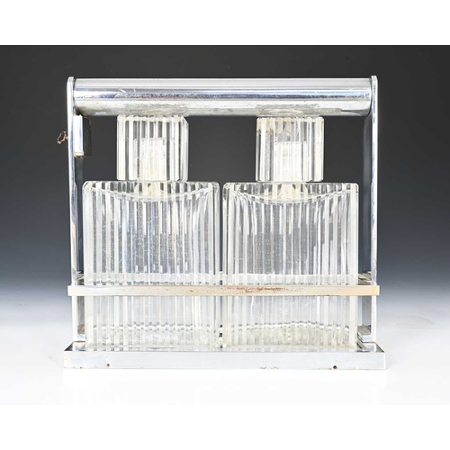 225 - Jacques Adnet for Baccarat, an Art Deco chrome plated and cut glass tantalus, circa 1925, the two cu... 