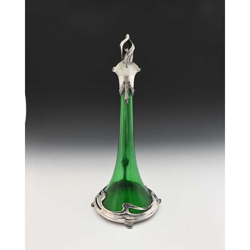 239 - WMF (attributed), a Jugendstil silver plate mounted glass claret jug, the green trumpet form body en... 