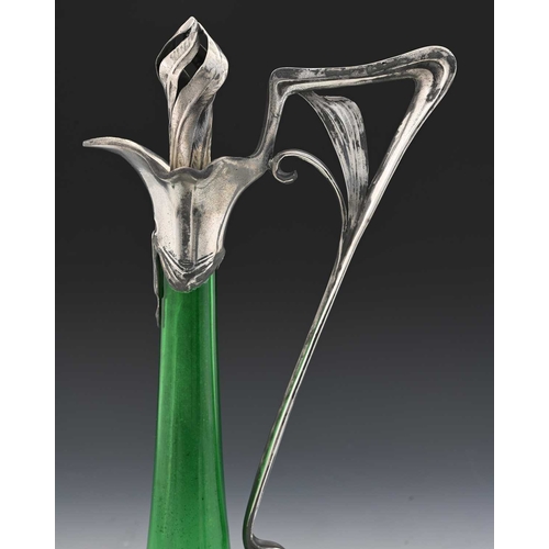 239 - WMF (attributed), a Jugendstil silver plate mounted glass claret jug, the green trumpet form body en... 