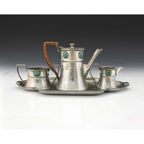 241 - An Arts and Crafts pewter and Ruskin cabochon set tea set, Ashberry Pewter circa 1915, palnished fla... 