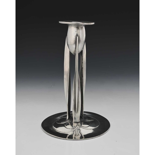 248 - Archibald Knox for Liberty and Co., a Tudric Arts and Crafts pewter candlestick, model 0223, the ovo... 