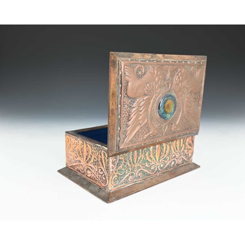 256 - An Arts and Crafts copper clad and Ruskin set box, the lid repousse embossed in relief with two grif... 