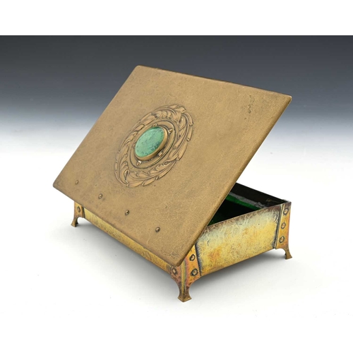 257 - An Arts and Crafts Ruskin set brass jewellery casket, probably A E Jones, circa 1910, the wide brimm... 