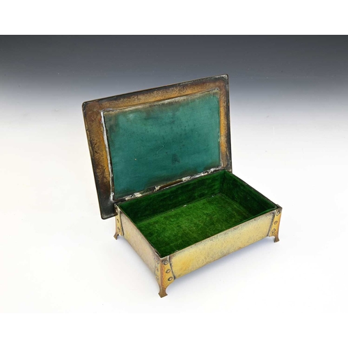 257 - An Arts and Crafts Ruskin set brass jewellery casket, probably A E Jones, circa 1910, the wide brimm... 