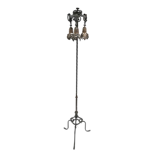 263 - Alessandro Mazzucotelli (Italian, 1865- 1938), a wrought iron standard lamp, circa 1910, the twisted... 