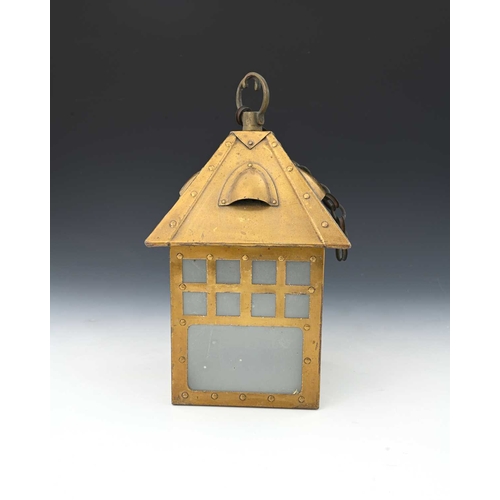 264 - A Glasgow School Arts and Crafts brass lantern pendant light, cuboid house form with pitched roof an... 