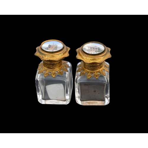 321 - A pair of French Palais Royale Grand Tour scent bottles, circa 1850s, each glass body of cuboid form... 